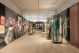 Exhibition view, United by Queerness with objects related to the Eurovision Song Contest