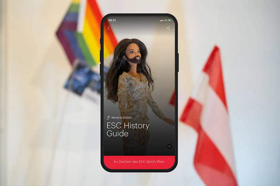 Sujet mit Conchita Wurst Puppe mit Text: ESC History Guide