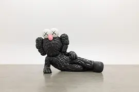 A comic-style bronze figure by KAWS titled “Time Off”