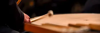 Man beating a drum