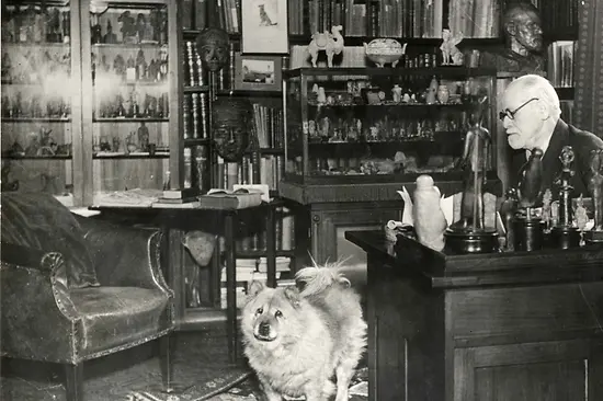 Sigmund Freud in his study with chow, 1937