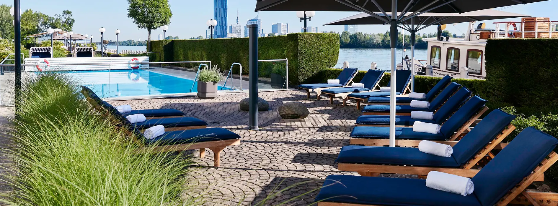 Outdoor pool with loungers