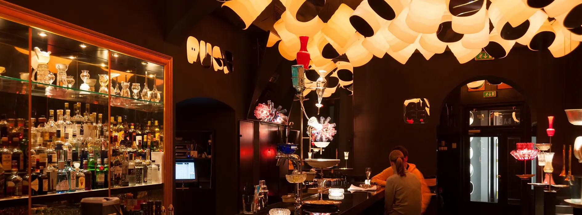 Puff Bar, interior shot with a view of the bar and guests 