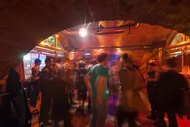 Rhiz, interior shot with young people celebrating 