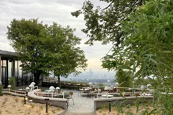 Outdoor dining area with a view of Vienna