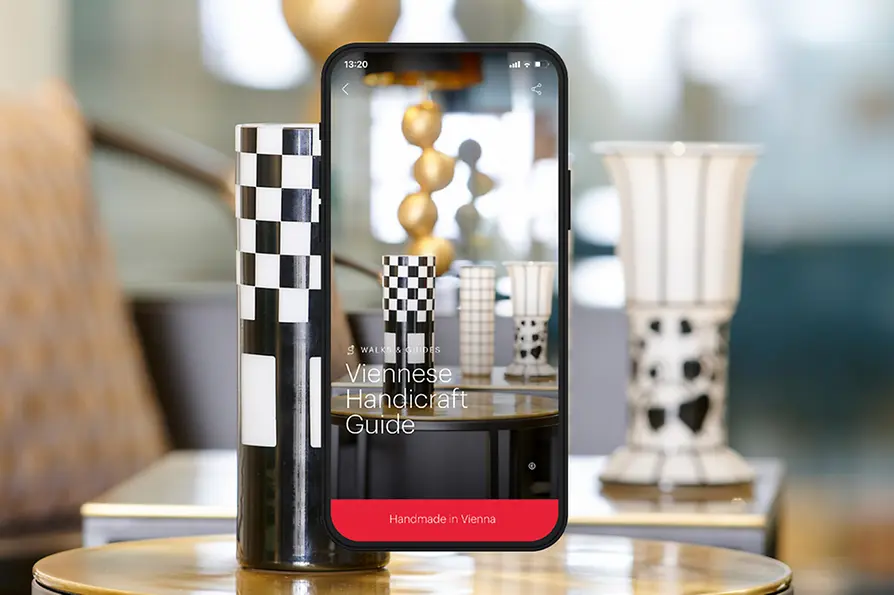 Smart phone display with text: Viennese Handicraft Guide