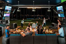 Young people playing golf and partying