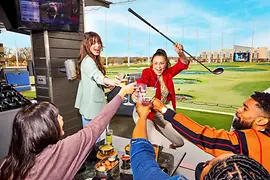 Young people playing golf and partying