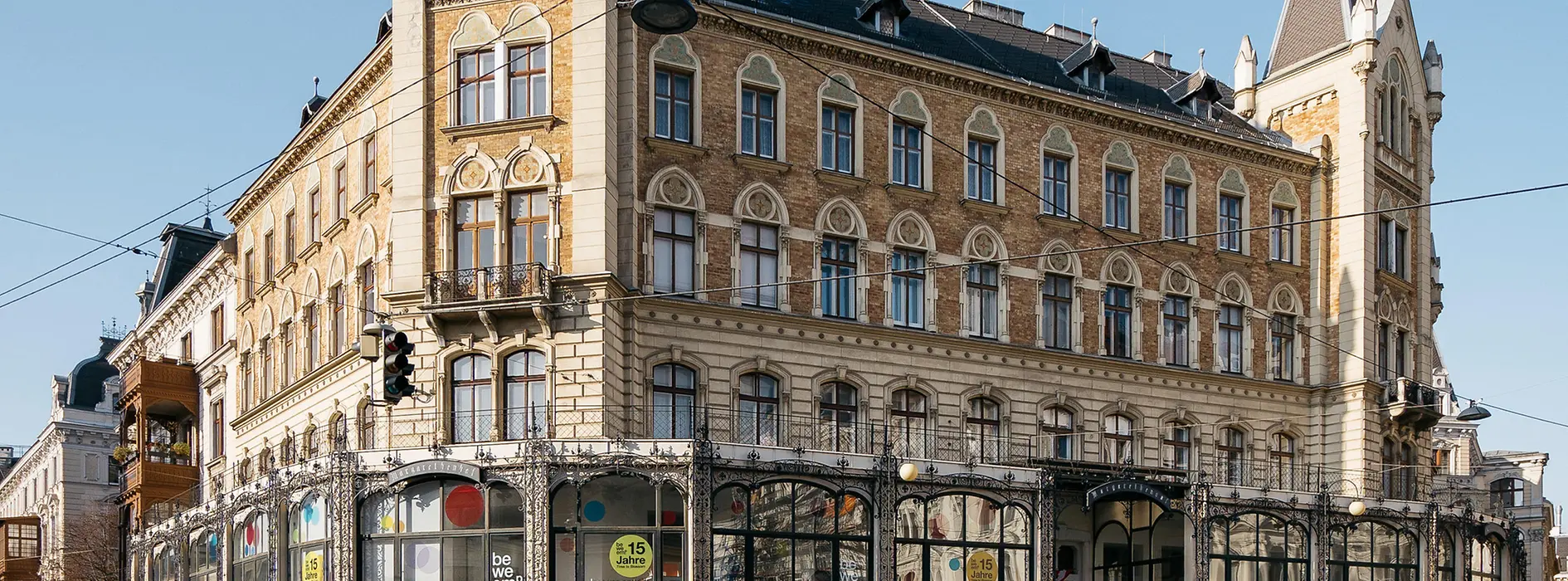 The Margaretenhof, a multi-story private residential building in the late historicist style from 1884/85 with a brick facade and towers.